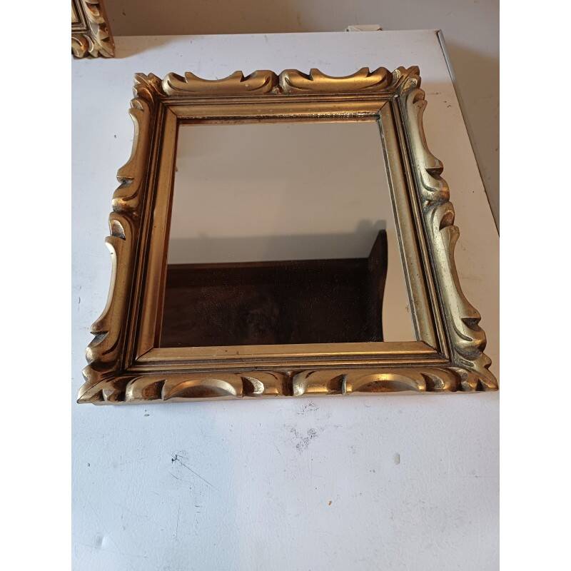 Pair of wood and gilded stucco mirrors