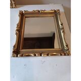 Pair of wood and gilded stucco mirrors