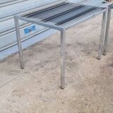 Pair of side tables in chrome metal and glass
