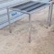 Pair of side tables in chrome metal and glass