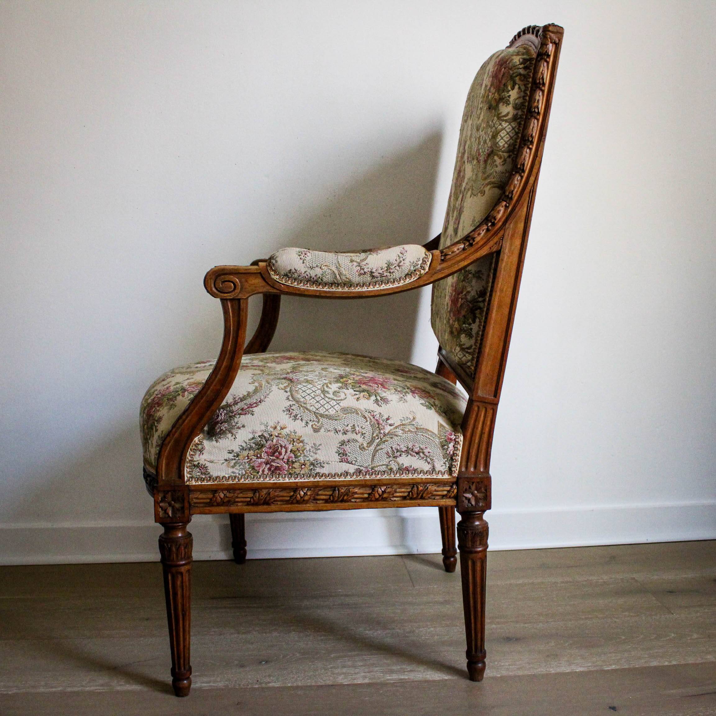 Louis XVI style carved armchair