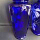 Pair of numbered white enamelled cobalt blue blown glass vases