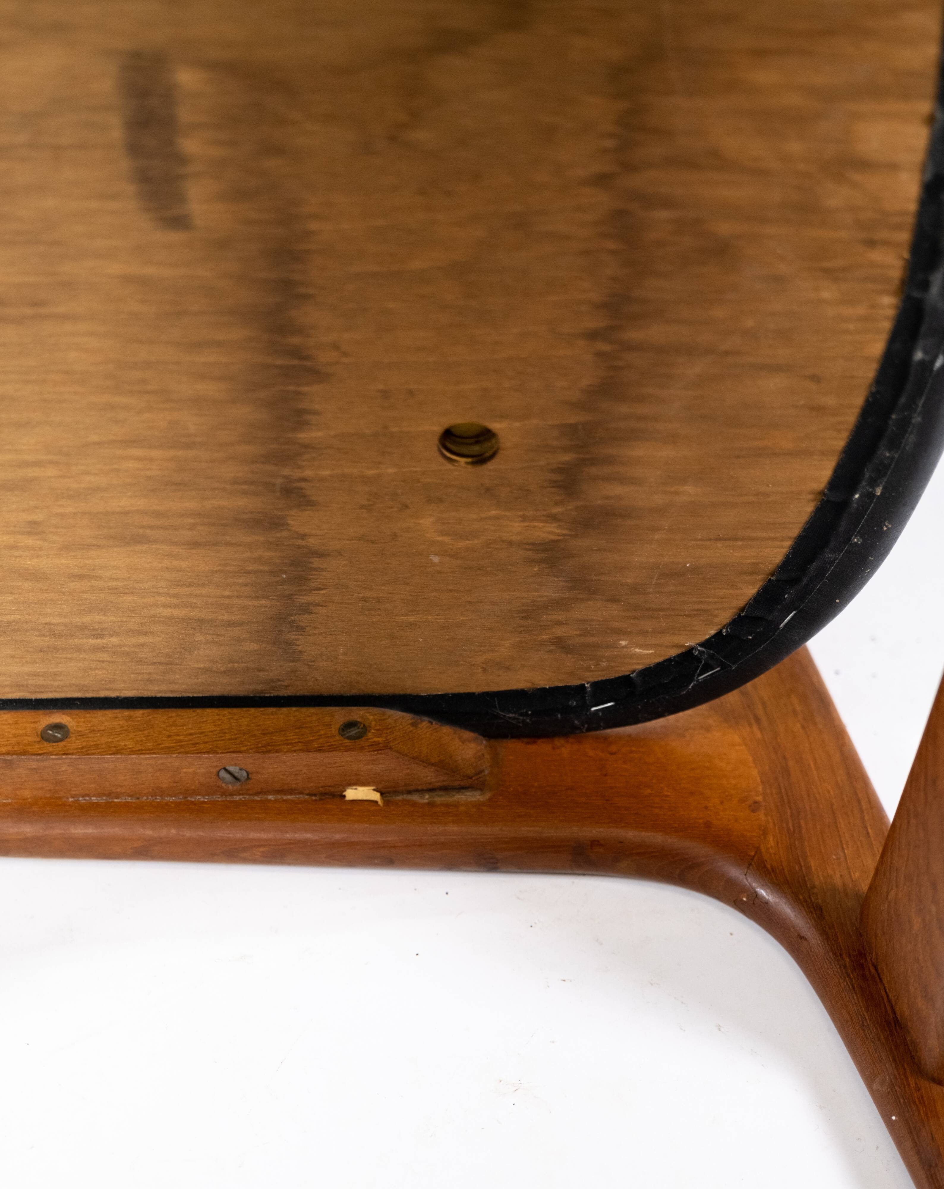 A set of four dining room chairs of teak of danish design, 1960s