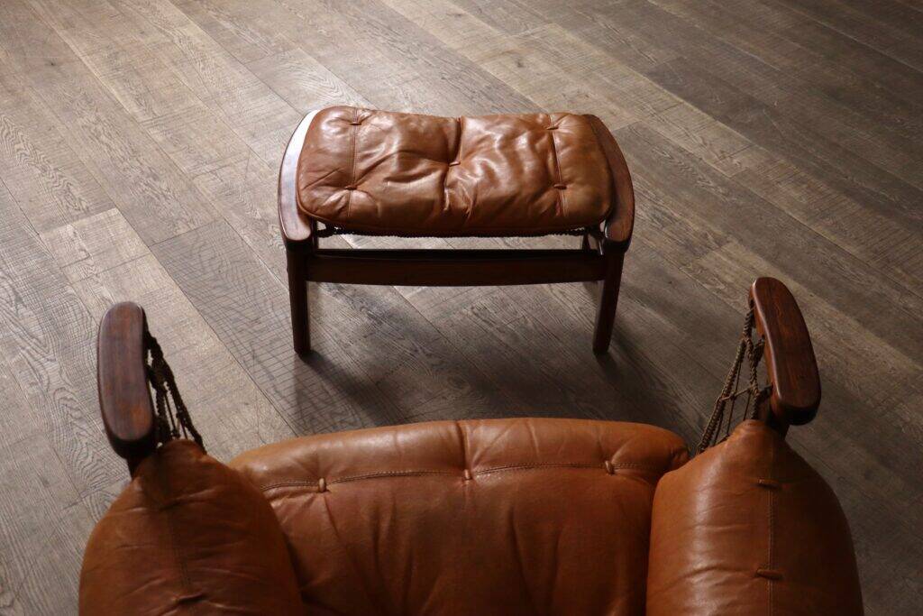 Jangada lounge chair with ottoman in cognac leather by Jean Gillon, Brazil, 1960s