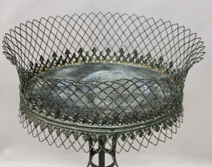 Wrought iron planter on stand