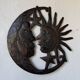 Brutalist metal wall sculpture "sun-moon"