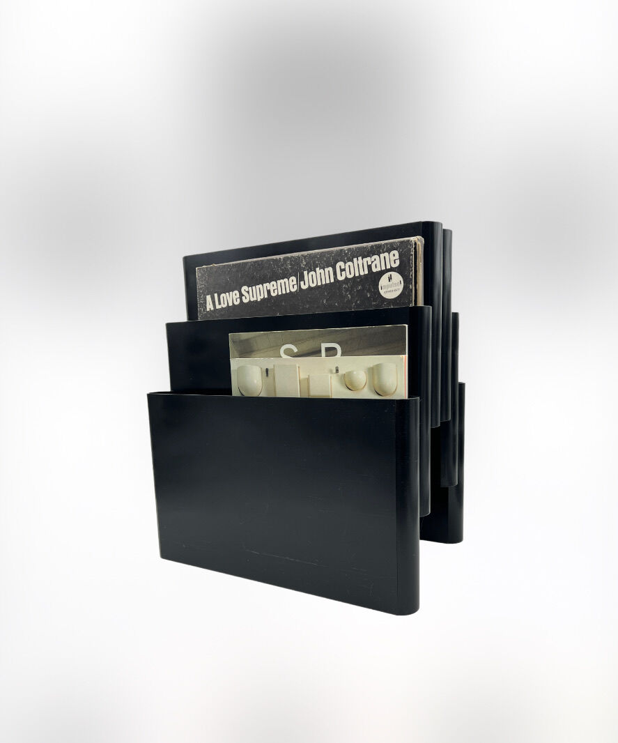 Magazine holder by Giotto Stoppino for Kartell 1970