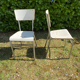 Pair of chairs in patinated white wood and metal structure