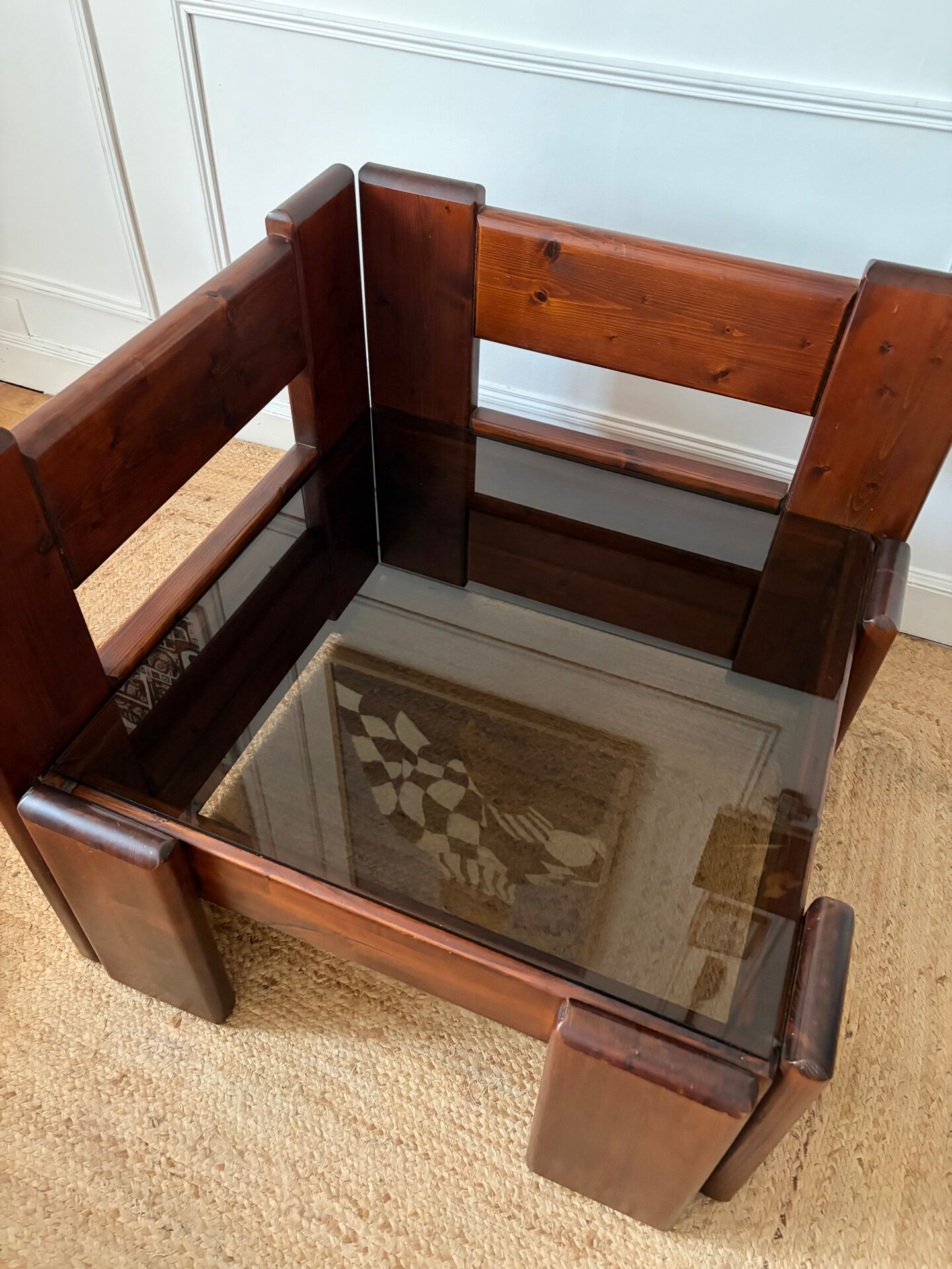 Modernist coffee table in wood and smoked glass.
