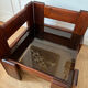 Modernist coffee table in wood and smoked glass.