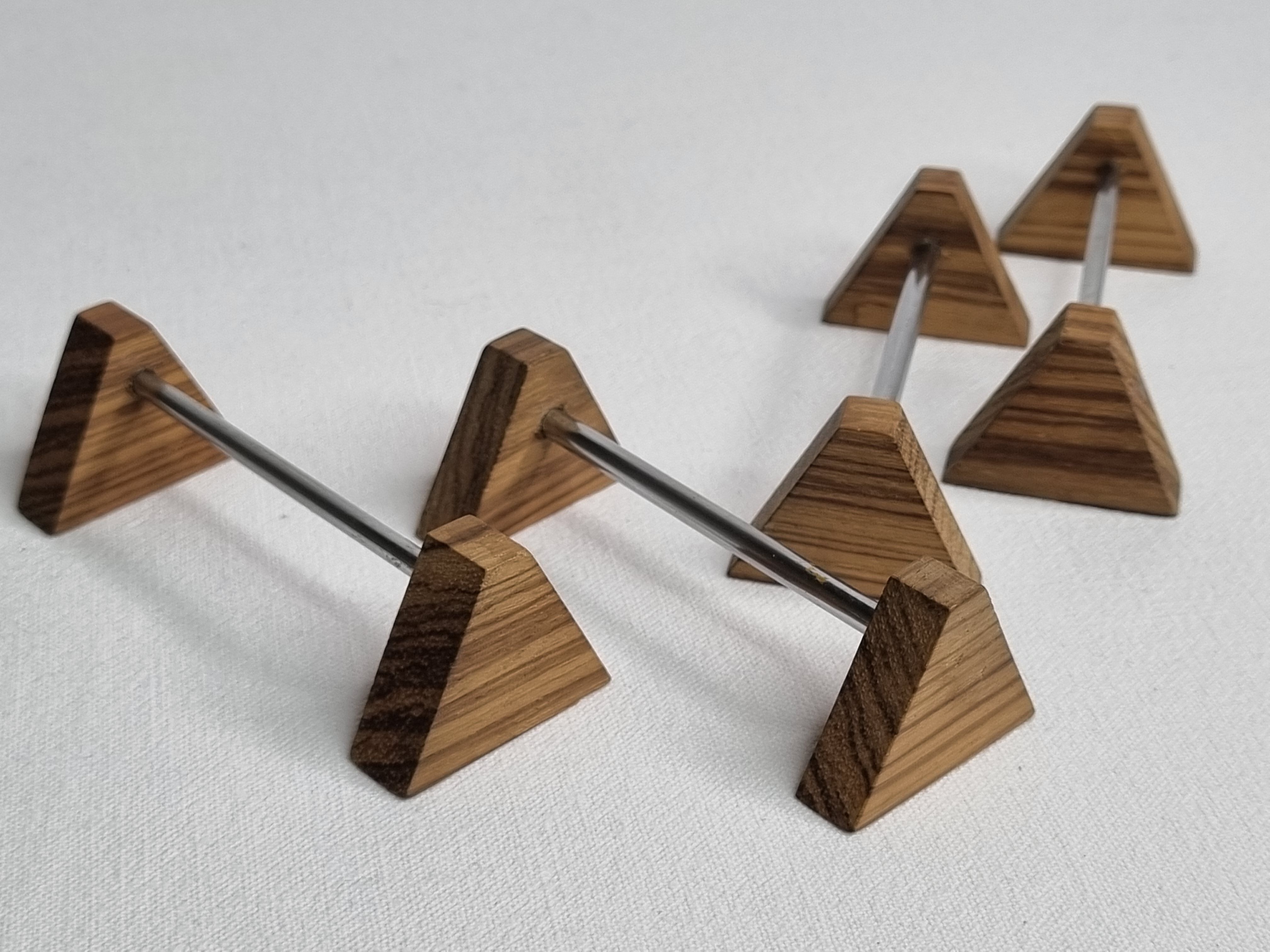 Set of four vintage metal and wood knife holders