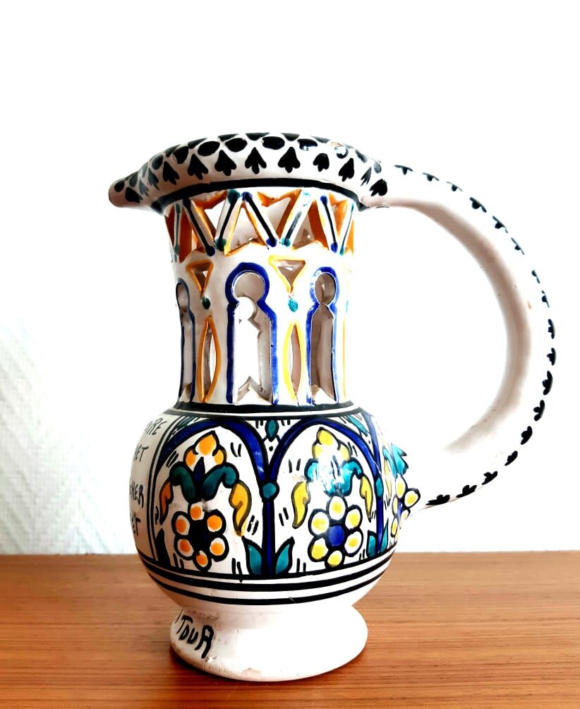 Deceptive pitcher in glazed earthenware