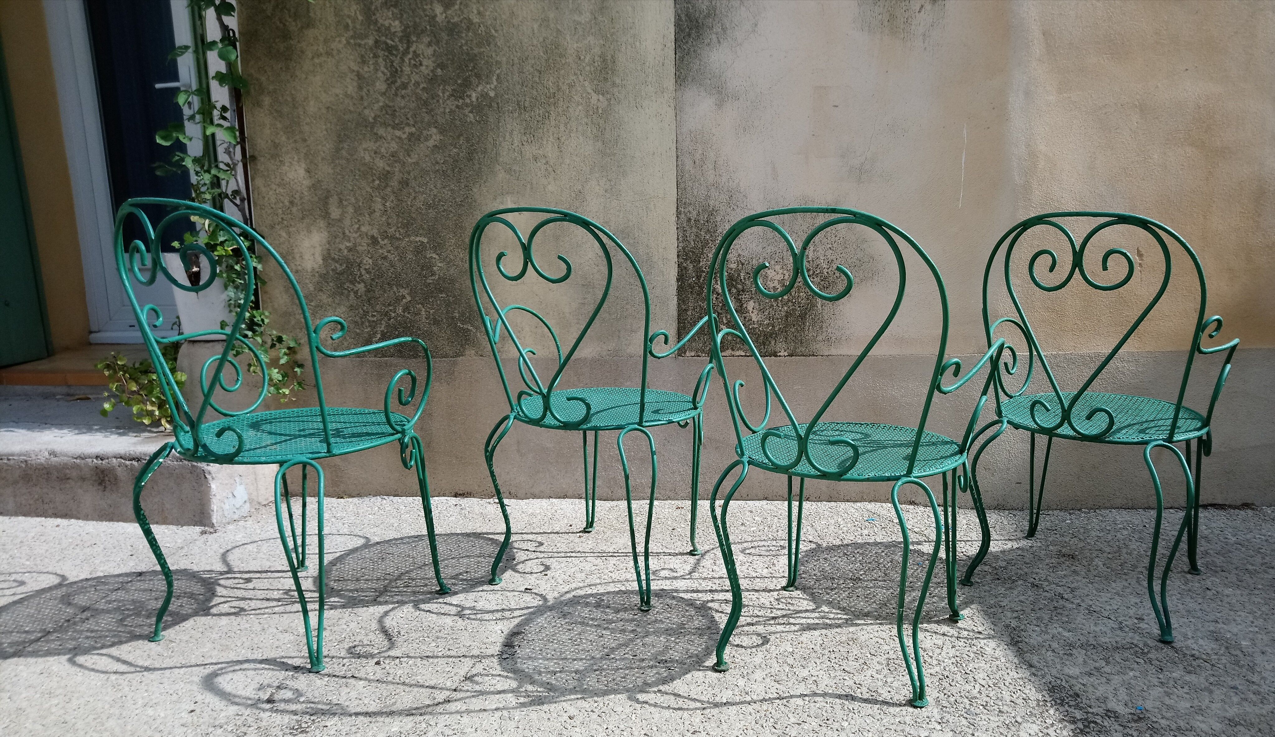 Suite de 4 fauteuils de jardin années 60