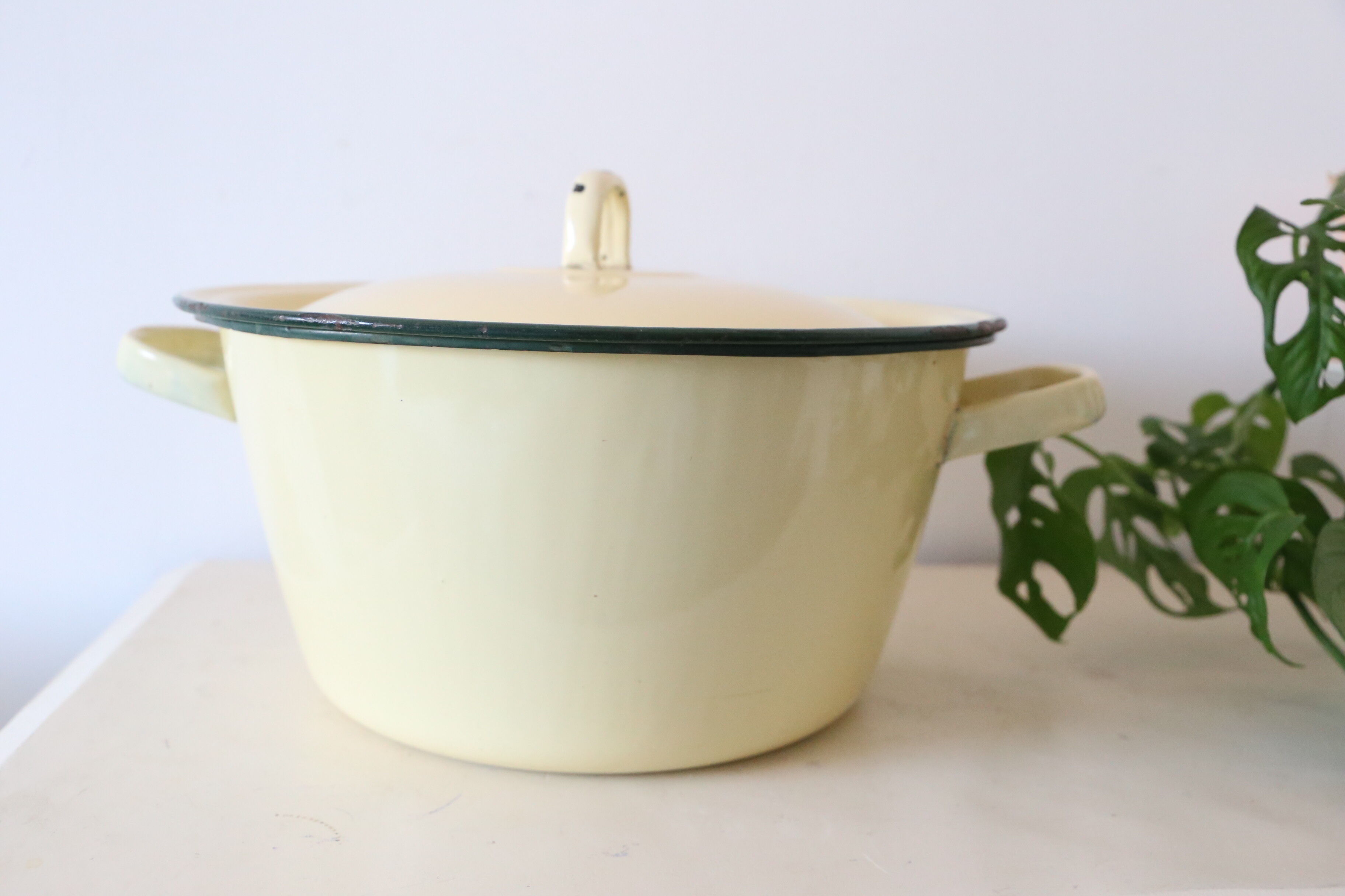 Enamelled metal marmite, pale yellow, vintage