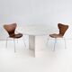 Round dining table in travertine from the 1980s.