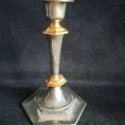 Pair of small English candlesticks in silver-plated metal and brass - 20th century.
