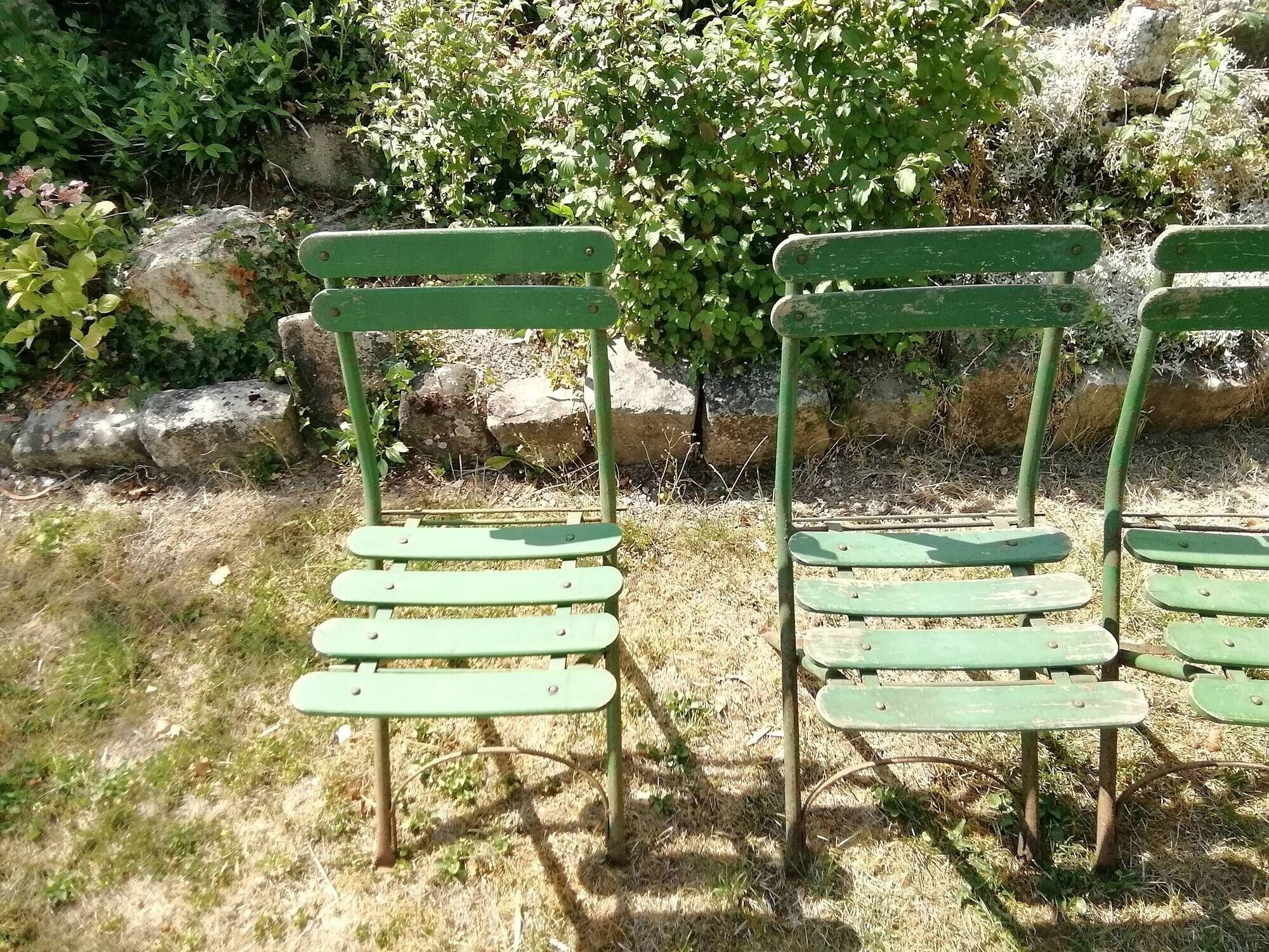 4 old iron and wood garden folding chairs