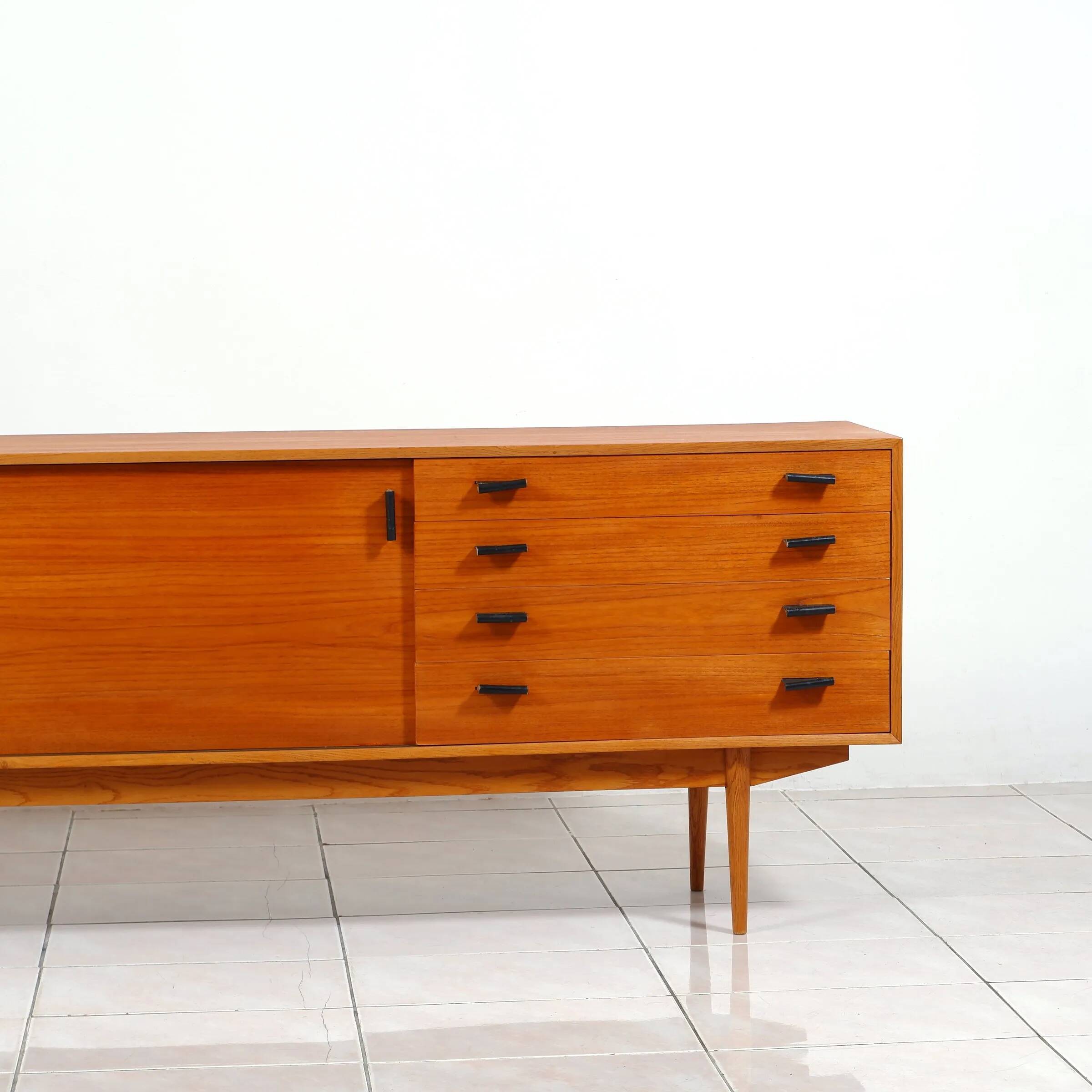 Swedish teak sideboard with leather handles