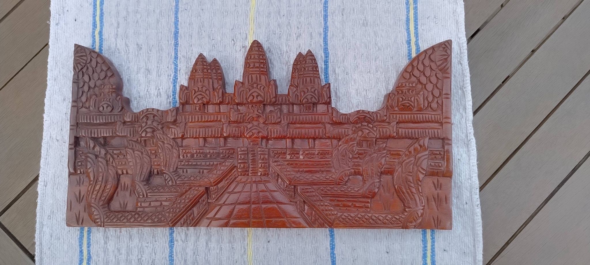 Carved wooden relief, reproduction of the Angkor Wat temple.