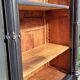 Monumental library with black two-tone oak.