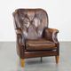 Vintage sheepskin armchair in a dark cognac colour with a comfortable seat