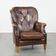 Vintage sheepskin armchair in a dark cognac colour with a comfortable seat