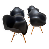 Eames plastic armchairs