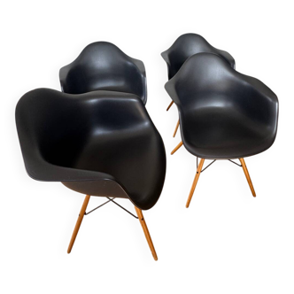 Eames plastic armchairs