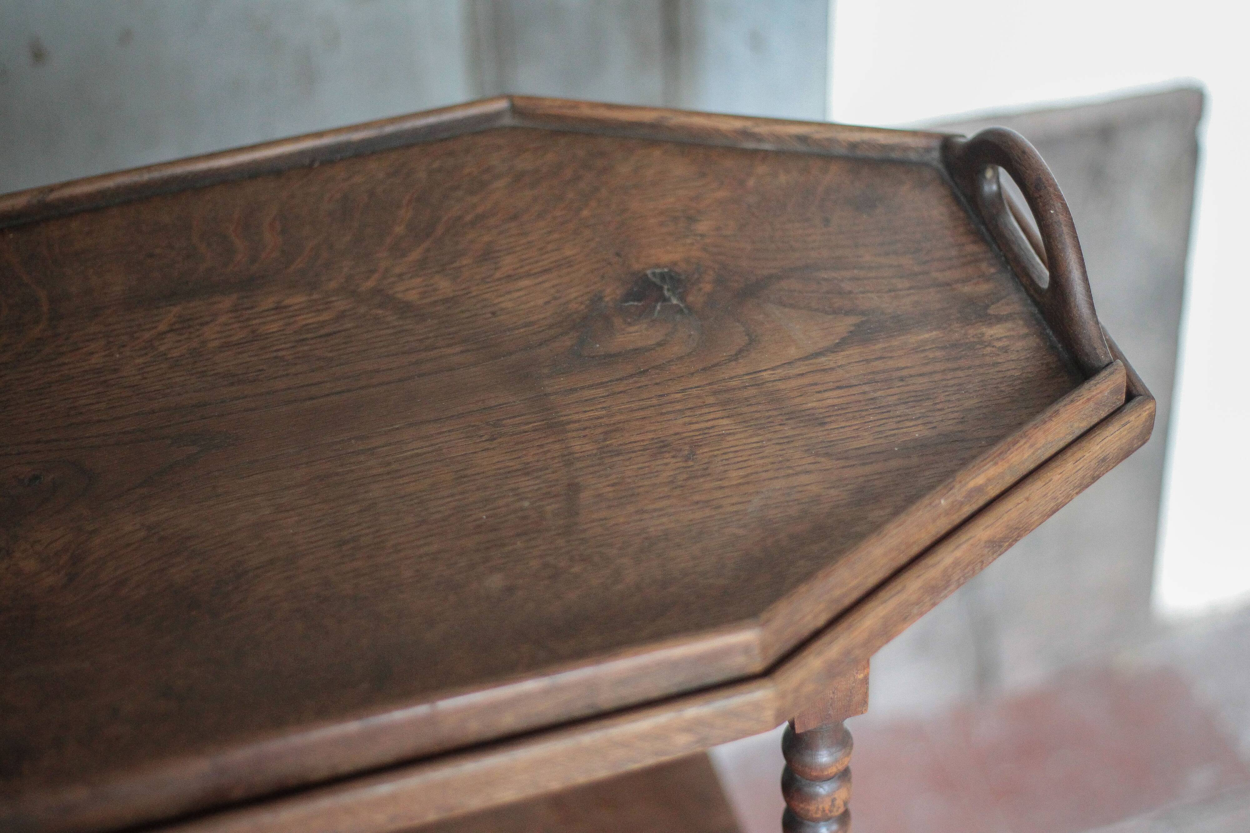 Vintage turned wood dessert trolley, wheeled table with removable top.