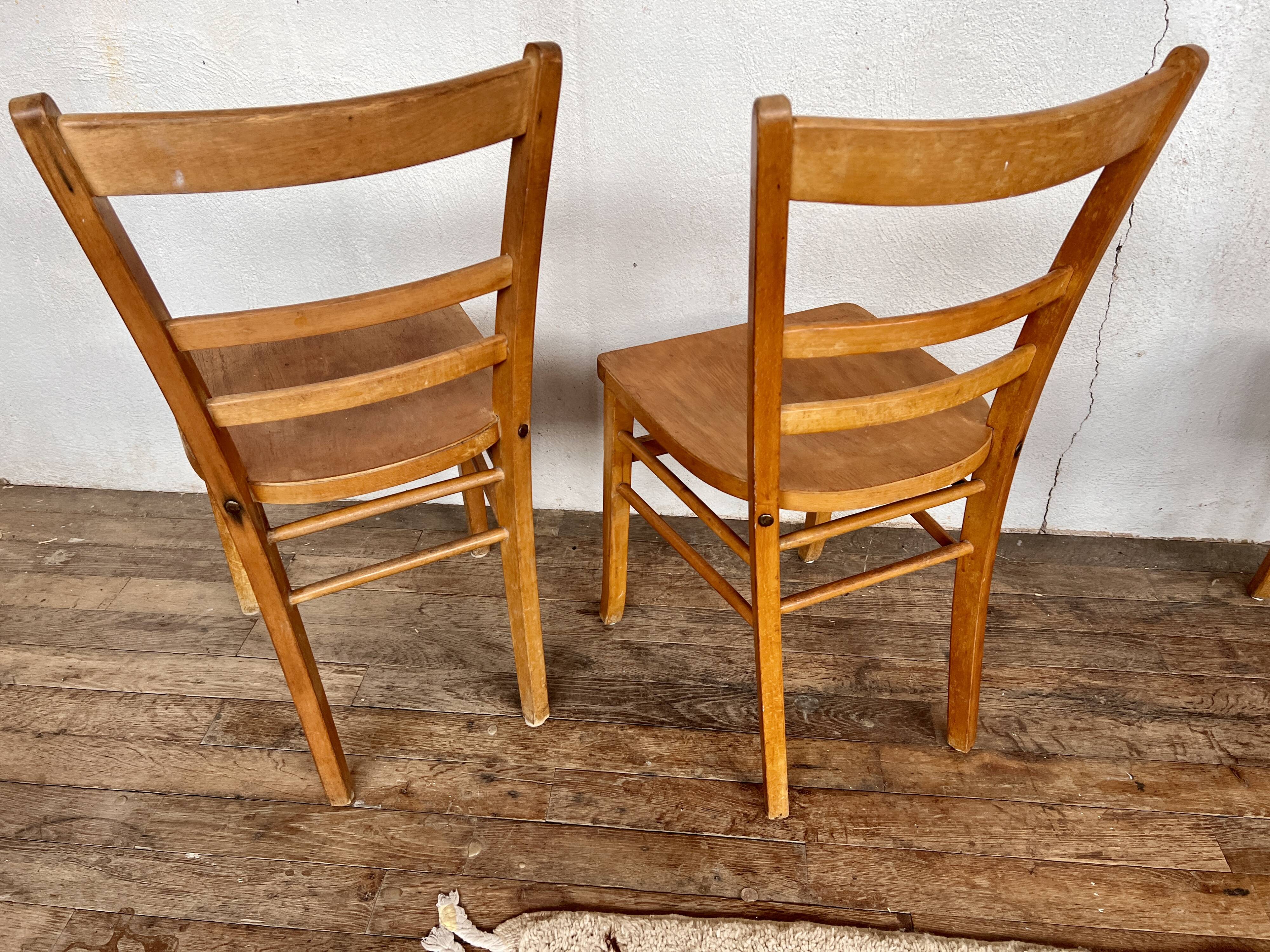 Series of 4 vintage light wood bistro chairs