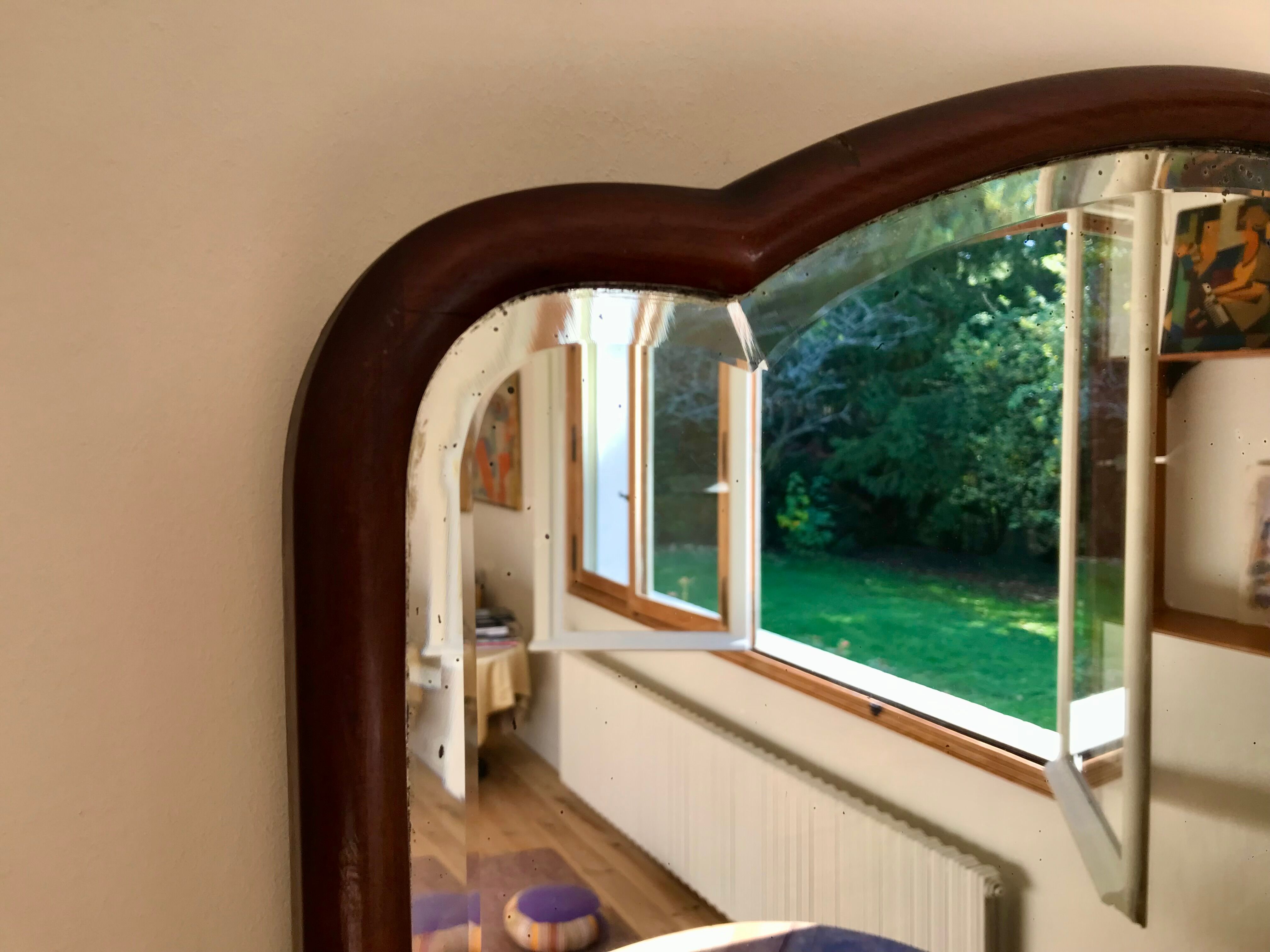 Beveled mahogany mirror, circa 1930