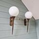 Pair of Art Deco wall sconces in brass and white opaline, 1930.