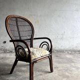 Mid-century Manou dark brown bamboo armchair with open rattan backrest, 1960s French