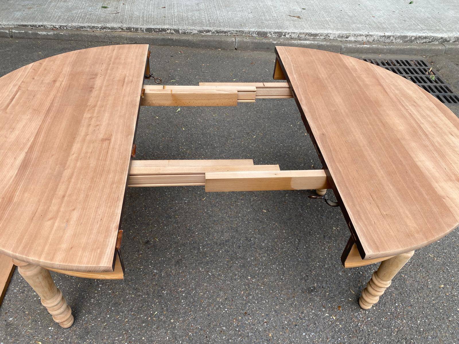 Round extendable dining table stripped in solid cherry wood France 1950
