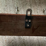 Wall coat rack from the 1950s-60s in solid oak and stainless steel.
