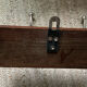Wall coat rack from the 1950s-60s in solid oak and stainless steel.