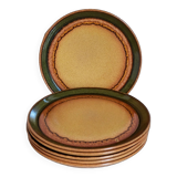 Six vintage stoneware plates with green net