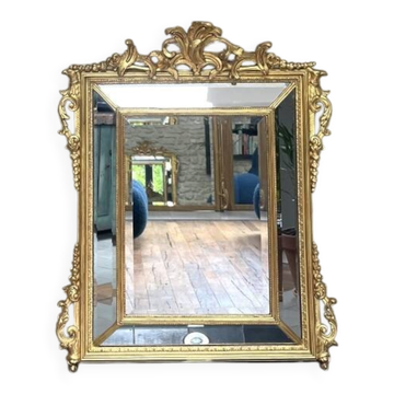 Antique mirror with a frame 123/100cm with gilded pediments, eagle heads, antique.