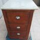 Central island shop counter in marble and oak, Art Deco period.