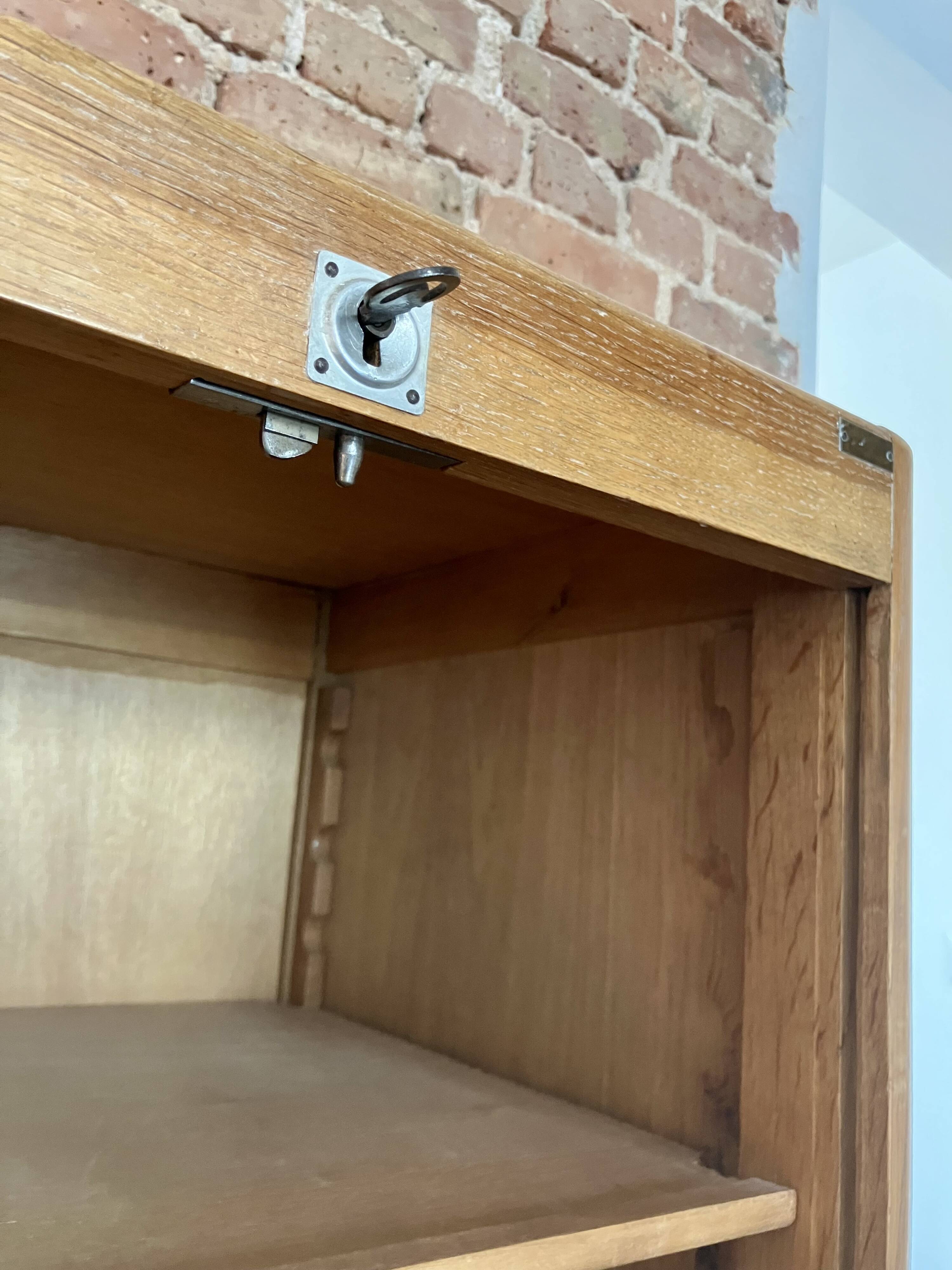 Double curtain filing cabinet in oak — on legs
