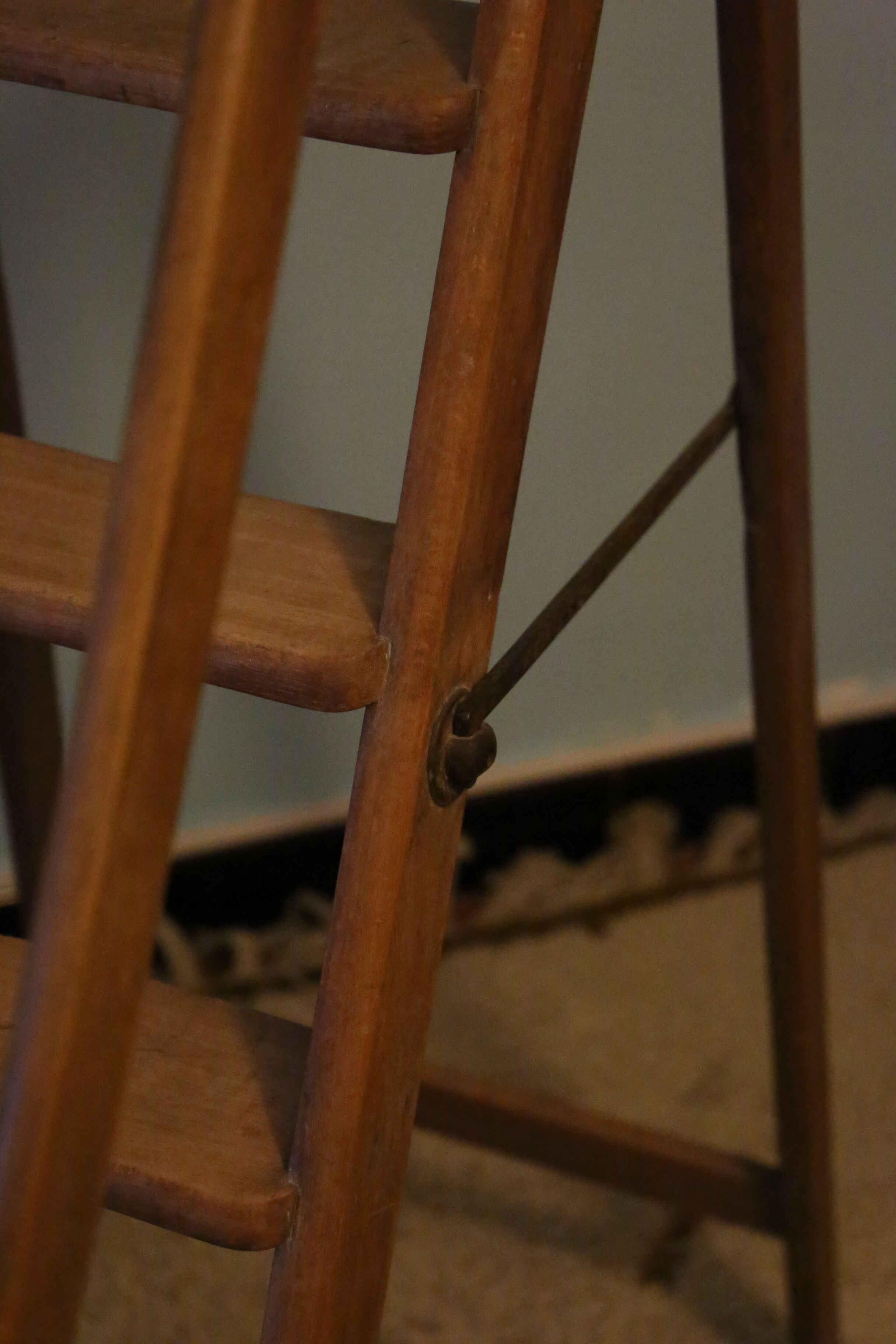 Old wooden stepladder with bodyguards