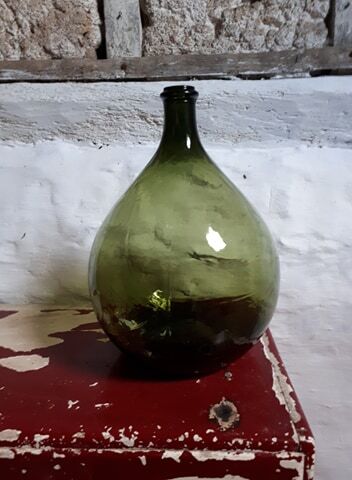 Dark green demijohn