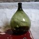 Dark green demijohn