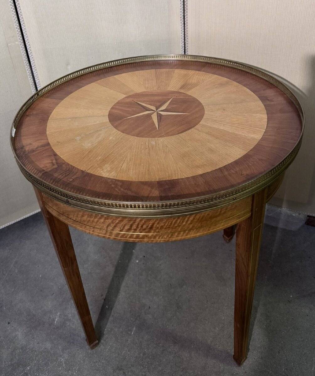 Bouillotte table in Louis XVI style with marquetry and gilded brass inlays.