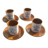 4 ceramic cups and saucers