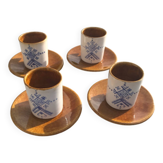 4 ceramic cups and saucers
