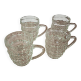 Set of four glass mugs
