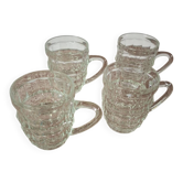 Lot de quatre chopes en verre