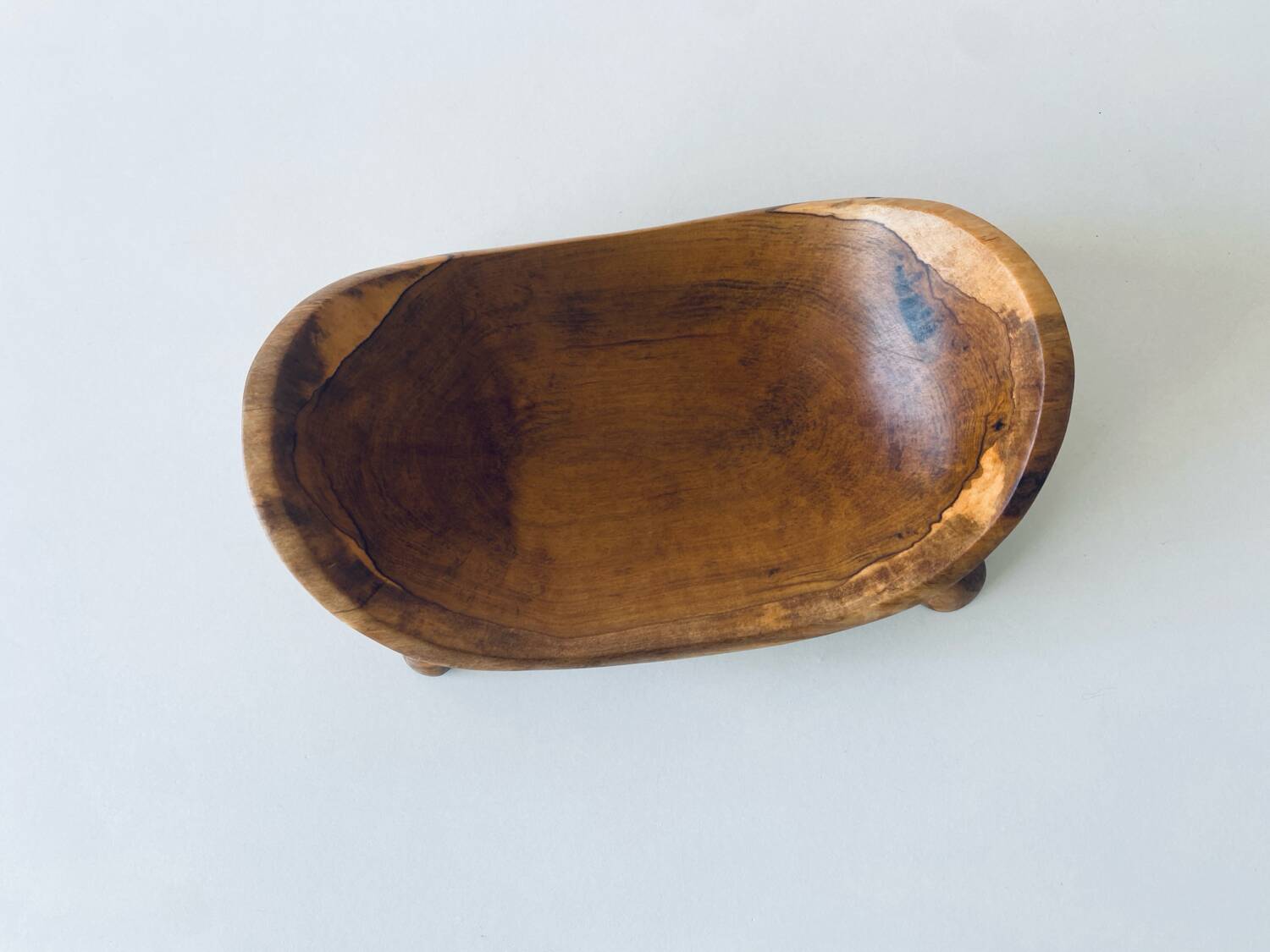 Olive wood pocket emptier