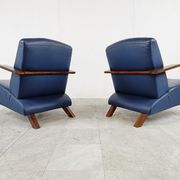 Paire de fauteuils en bois courbé et cuir bleu, années 1970